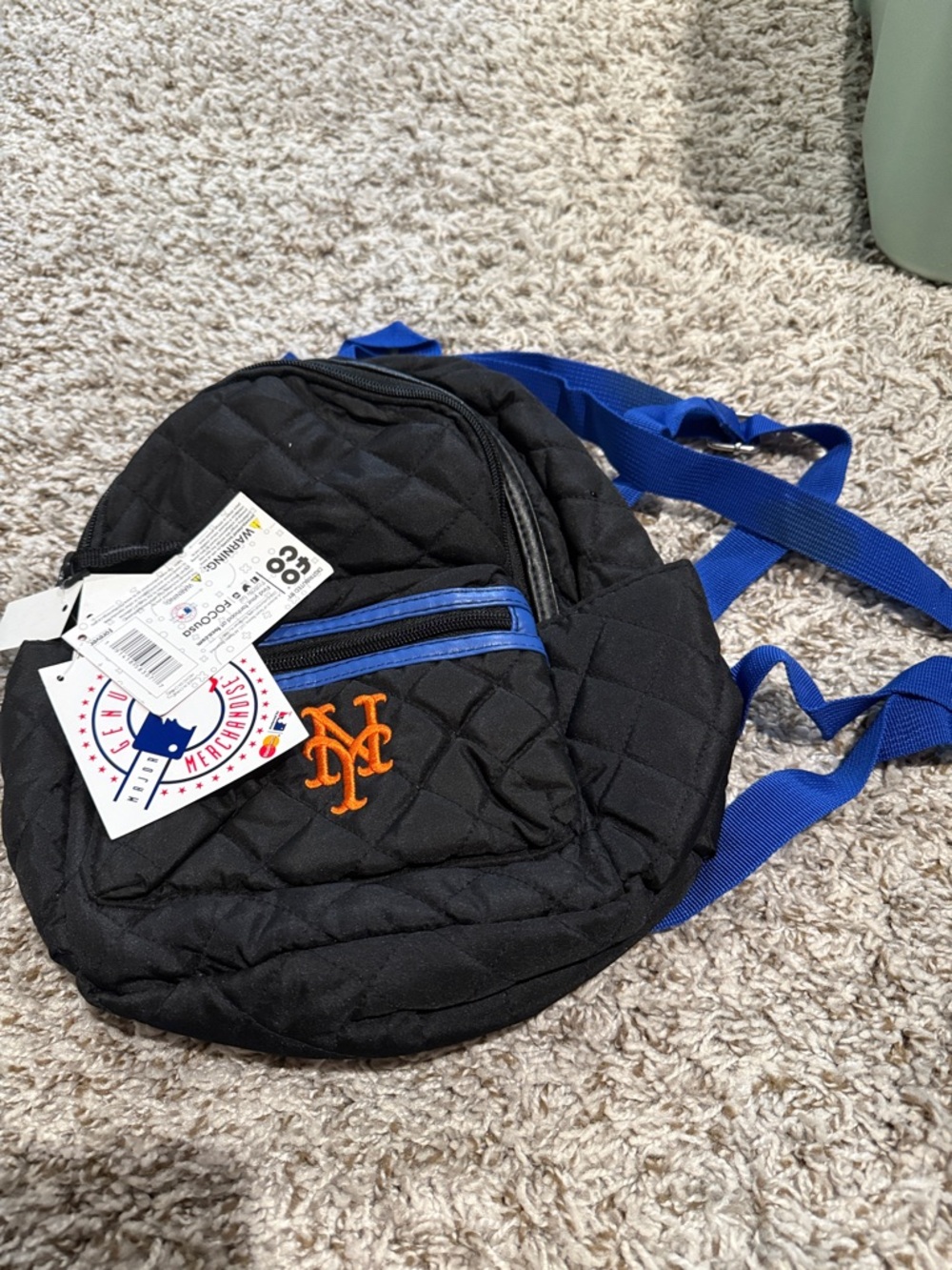 Genuine MLB merch NYM New York Mets mini back pack. Quilted new with tags.